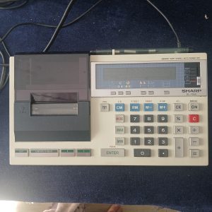 Sharp Electronic Calculator (new battery requruired)